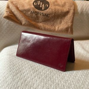 MONSAC red leather wallet.